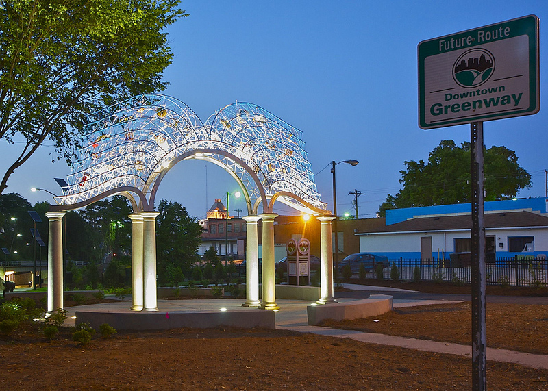 The Gateway of the Open Book by Brower Hatcher is public art installation on the Morehead Park section of the Downtown Greenway.