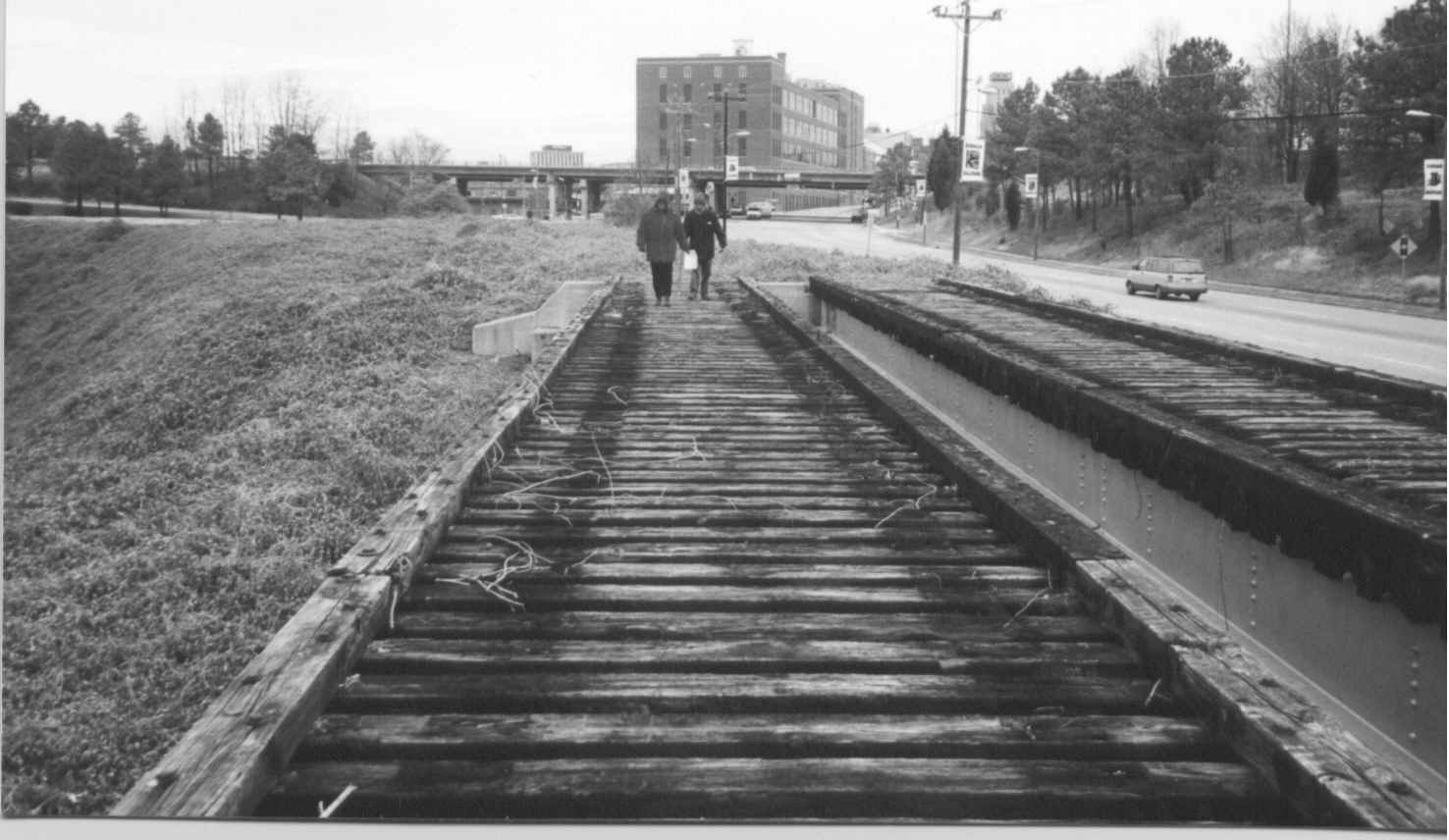 A historical picture of the former railroad tracks near what would become the trailhead of the American Tobacco Trail.