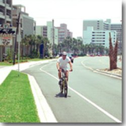A bicyclist rides along a bike lane in SC.